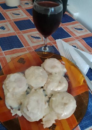 Una foto de Sorrentinos de jamón, panceta y queso dambo