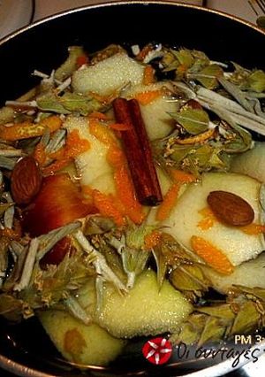 A picture of Greek mountain tea with apple, cinnamon and orange.