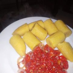 A picture of Plantain with pepper sauce.