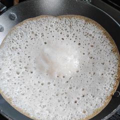 Appam (with rice powder) A picture of Appam (with rice powder).