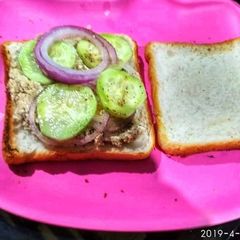 A picture of Chilli paneer  and egg sandwich.