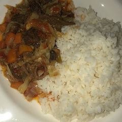 A picture of Rice with vegetable soup & orisirisi.