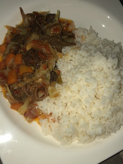 A picture of Rice with vegetable soup & orisirisi.