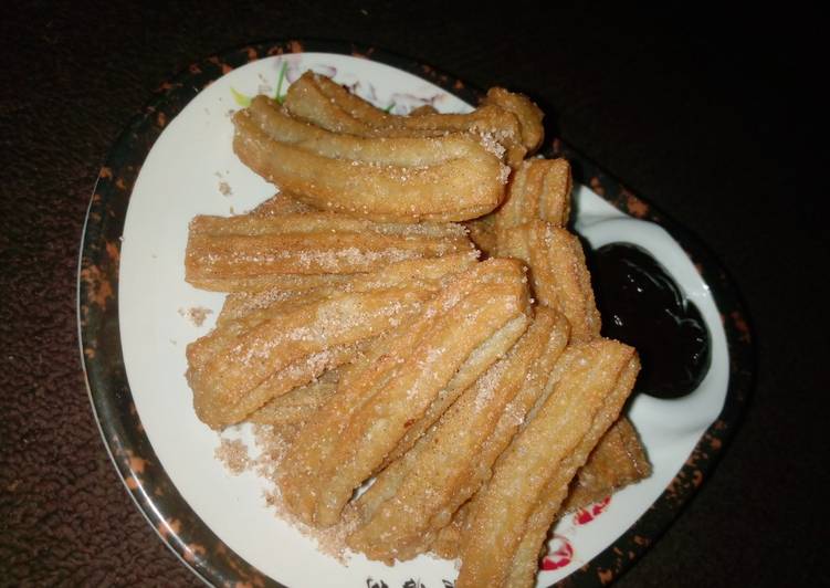 Cinnamon churros and cinnamon chocolate sauce