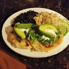 A picture of Brad's pupusas de rajas with frijoles negro and Arroz verde.