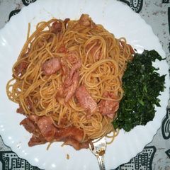 A picture of Spaghetti all'amatriciana with mchicha.