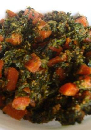 A picture of Fenugreek Leaves with Red Carrots.