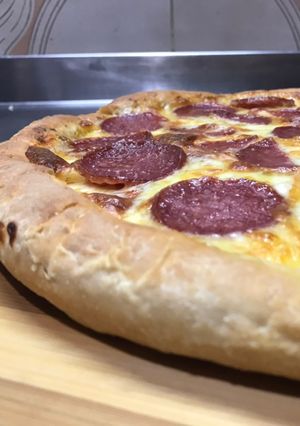 Una foto de Variedades de pizza: Calabresa (o algo parecido)