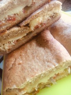 Una foto de EMPANADA ARROLLADA DE TOMATES (relleno original de 🇮🇹SICILIA ITALIA 🇮🇹)