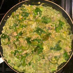 A picture of Leek and onion cous cous w pesto sauce.