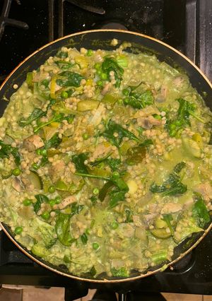A picture of Leek and onion cous cous w pesto sauce.