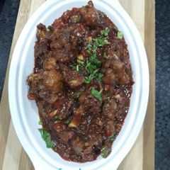 A picture of Onion tomato gobhi manchurian.