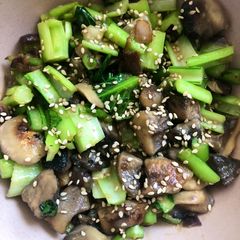 A picture of Mushrooms and greens - vegan.