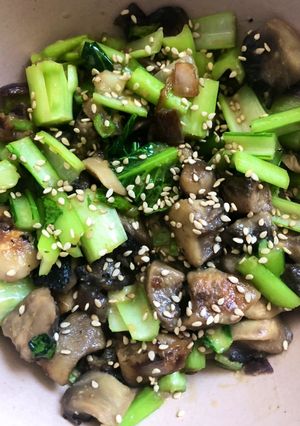 A picture of Mushrooms and greens - vegan.