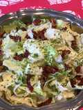 Salade iceberg aux tomates confites séchées et persil