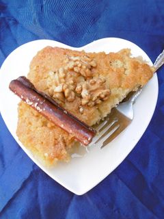 A picture of Ravani (Semolina Cake with Cinnamon Syrup).