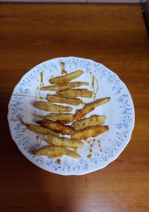 Foto principal de Bastoncillos de berenjena con miel en tempura de cerveza