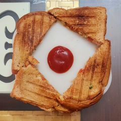 A picture of Cucumber tomato grilled sandwich.