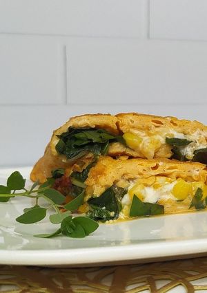 Una foto de Omelette de acelga, queso de cabra y choclo