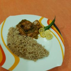 Chilli chicken with rice A picture of Chilli chicken with rice.