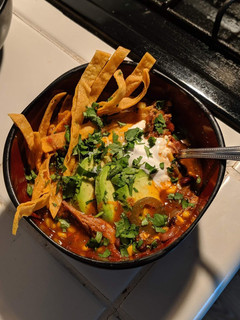 A picture of Pulled pork tortilla soup.