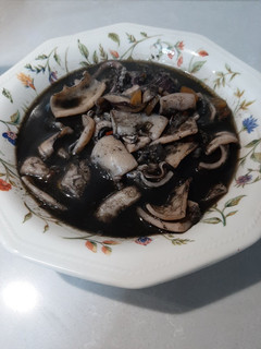 Una foto de Calamares en su tinta