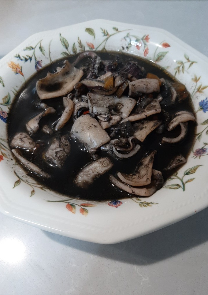 Una foto de Calamares en su tinta