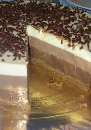 Una foto de Tarta de tres chocolates