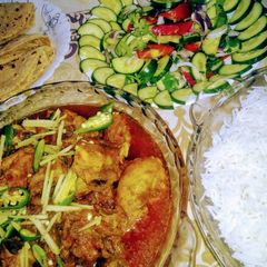 A picture of Chicken highway karahi with rice.