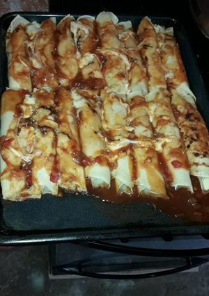 Una foto de Canelones de jamón y queso