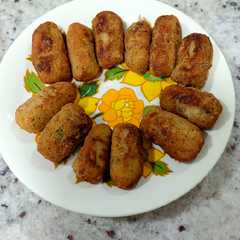 Una foto de Croquetas de bacon y dátiles
