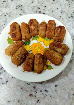 Una foto de Croquetas de bacon y dátiles