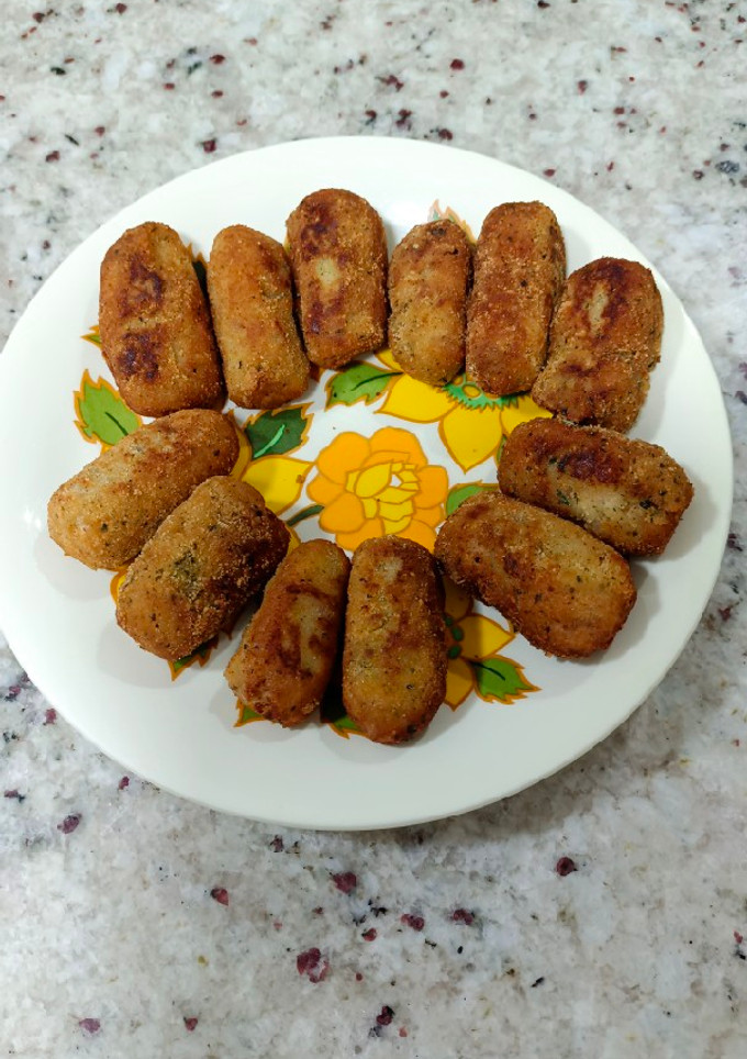 Una foto de Croquetas de bacon y dátiles