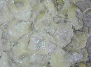 Una foto de Cappelletti con prosciutto crudo (pasta rellena)