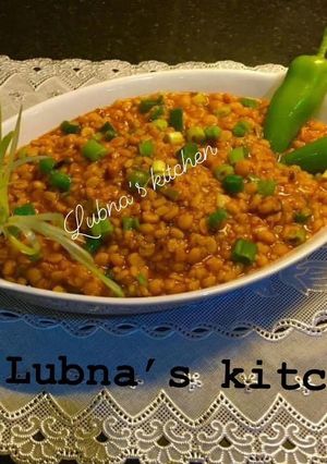 A picture of Chana Daal (bengal gram lentil) and maash Daal(WHITE URAD Daal Split lentil) Curry:.