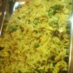 A picture of Mix veg and eggs fried rice.