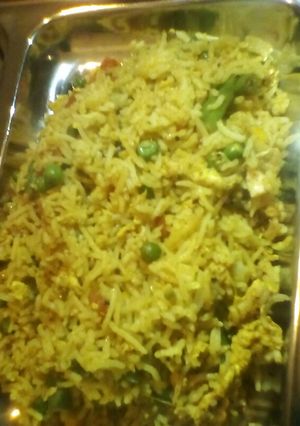 A picture of Mix veg and eggs fried rice.