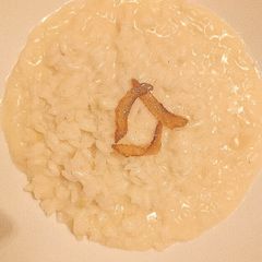 A picture of Taleggio cheese and pear risotto.