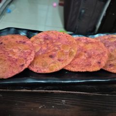 A picture of Beetroot poori.