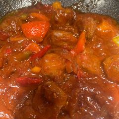 A picture of Meatball spicy tomato sauce (bumbu sarden).