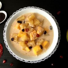 A picture of Avnaas Amba Saasam/Pineapple and Mango Coconut Curry.