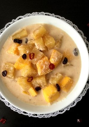 A picture of Avnaas Amba Saasam/Pineapple and Mango Coconut Curry.