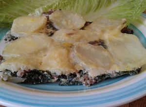 Una foto de Acelgas a la crema gratinadas con papas y queso