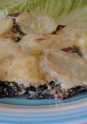 Una foto de Acelgas a la crema gratinadas con papas y queso