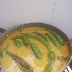 A picture of Chillies and Potatoes.