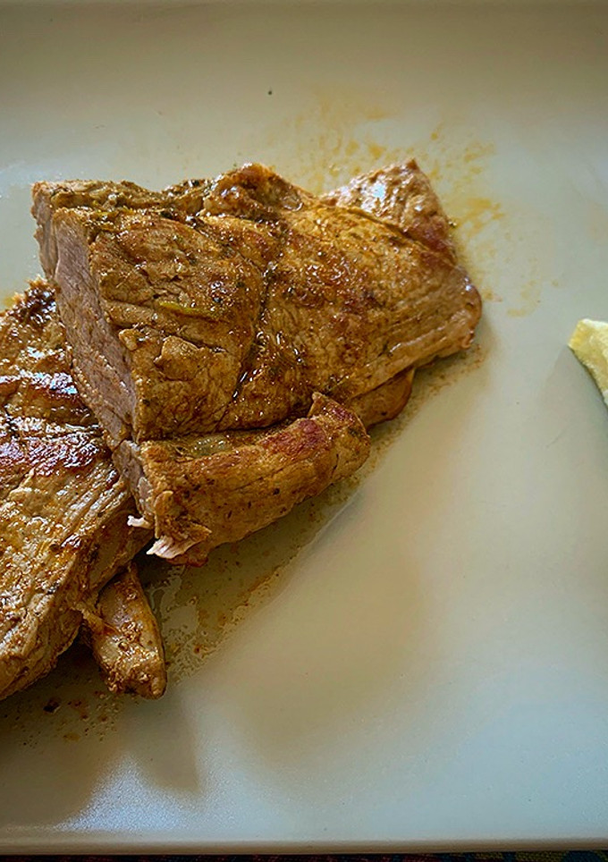 Una foto de Solomillo de cerdo abierto al horno