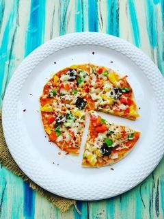 डोसा पिझ्झा (dosa pizza recipe in marathi) रेसिपी चे मुख्य फोटो