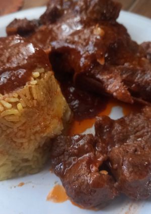 Una foto de Carne Guisada con Arroz
