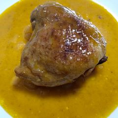 A picture of Spiced chicken with mango, pineapple, and coconut.