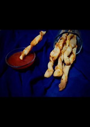 A picture of Tea Time Schezwan Twisties.
